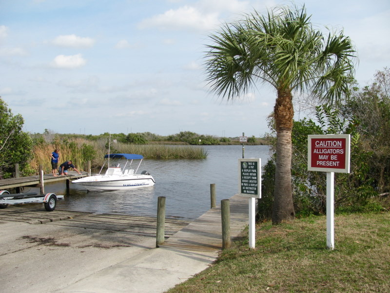 Within a mile of the confluence people are bringing in their boat from Widden Bay. Caution! Watch for alligators.