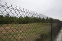 #2: View East from behind the chain-link fence, 81 feet from the confluence point, which lies in the left-hand side of this photo