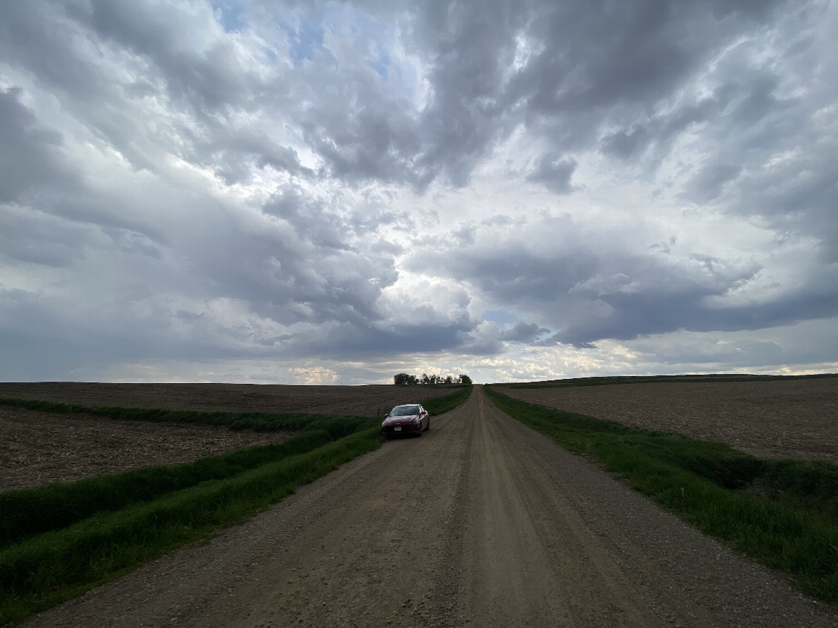 Nearest road to the confluence point, looking due south, as the rain began.