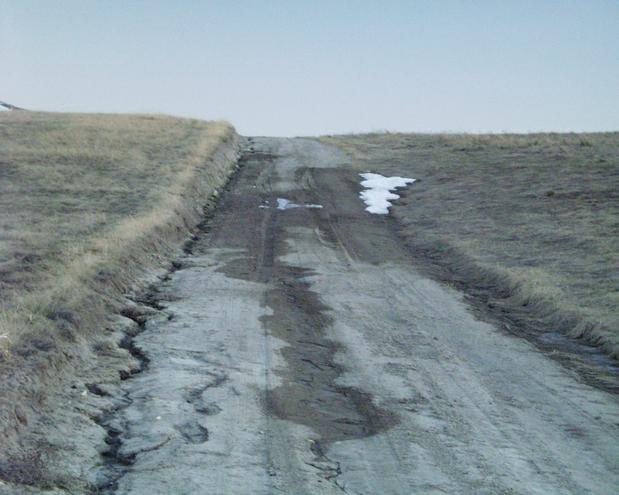 looking south and up a muddy road