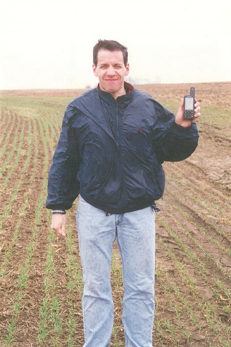 Tom grimaces as he faces into the driving rain for the photo.