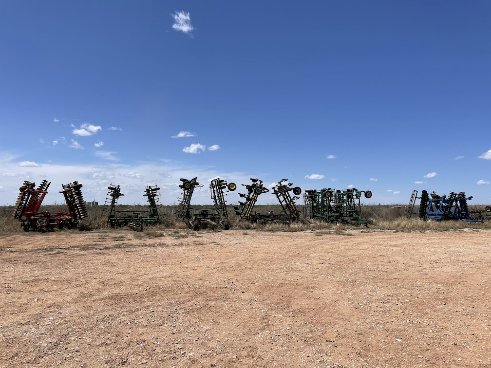 Colorful combines at rest where I parked