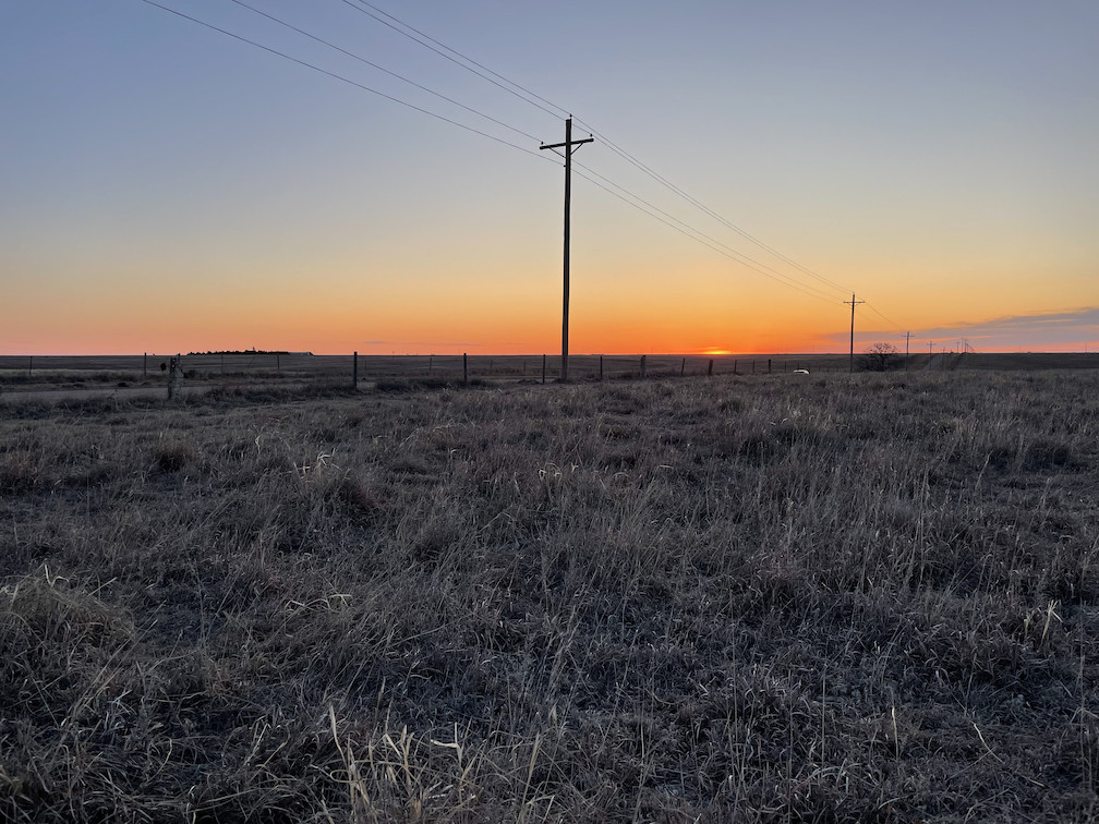 View ENE toward the confluence in the foreground, rising sun in the background