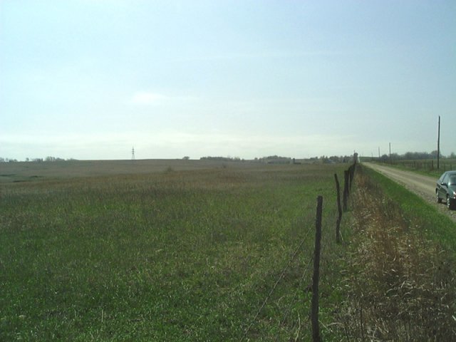 View to the south with the landowners house and my car