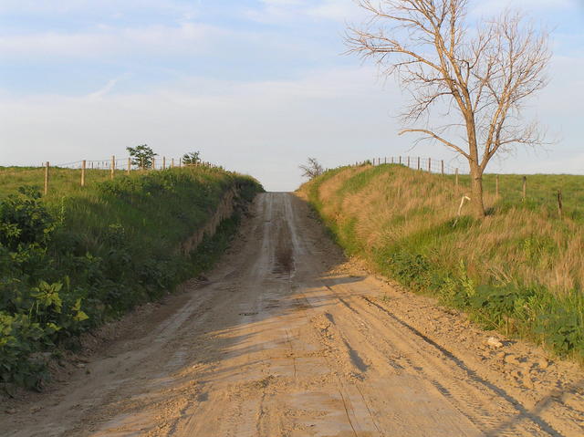 Very sandy closest road to the confluence, looking east:  Kansas on the right, Nebraska on the left!