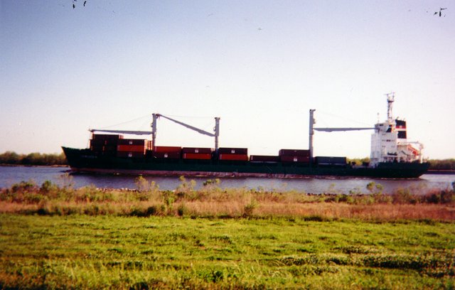 A barge goes by to the south.