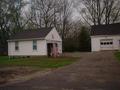 #5: Outhouse, enshrouded in original American flag and topped by Old Dixie.