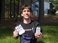 #2: Joseph Kerski sitting on the stone wall a few meters north of the confluence in his GeoGeek shirt.