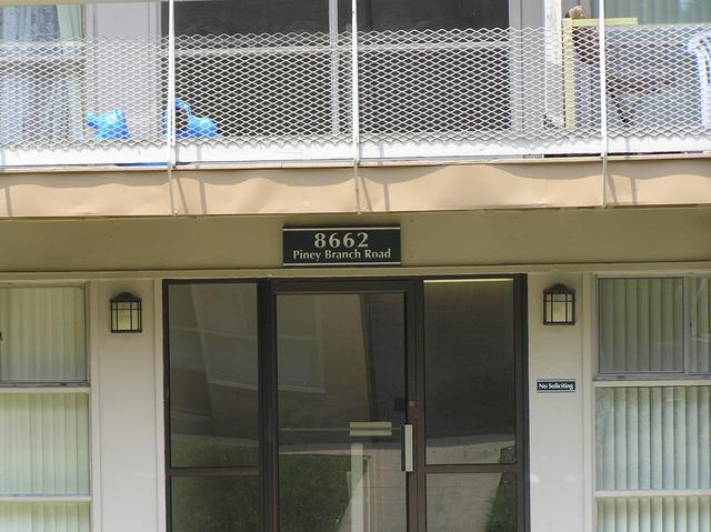 The confluence lies under the left stack of apartments in this building.