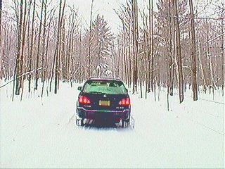 #1: View west, with family waiting in the car