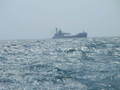 #8: A ship crosses our stern as we approach Ludington, Michigan.