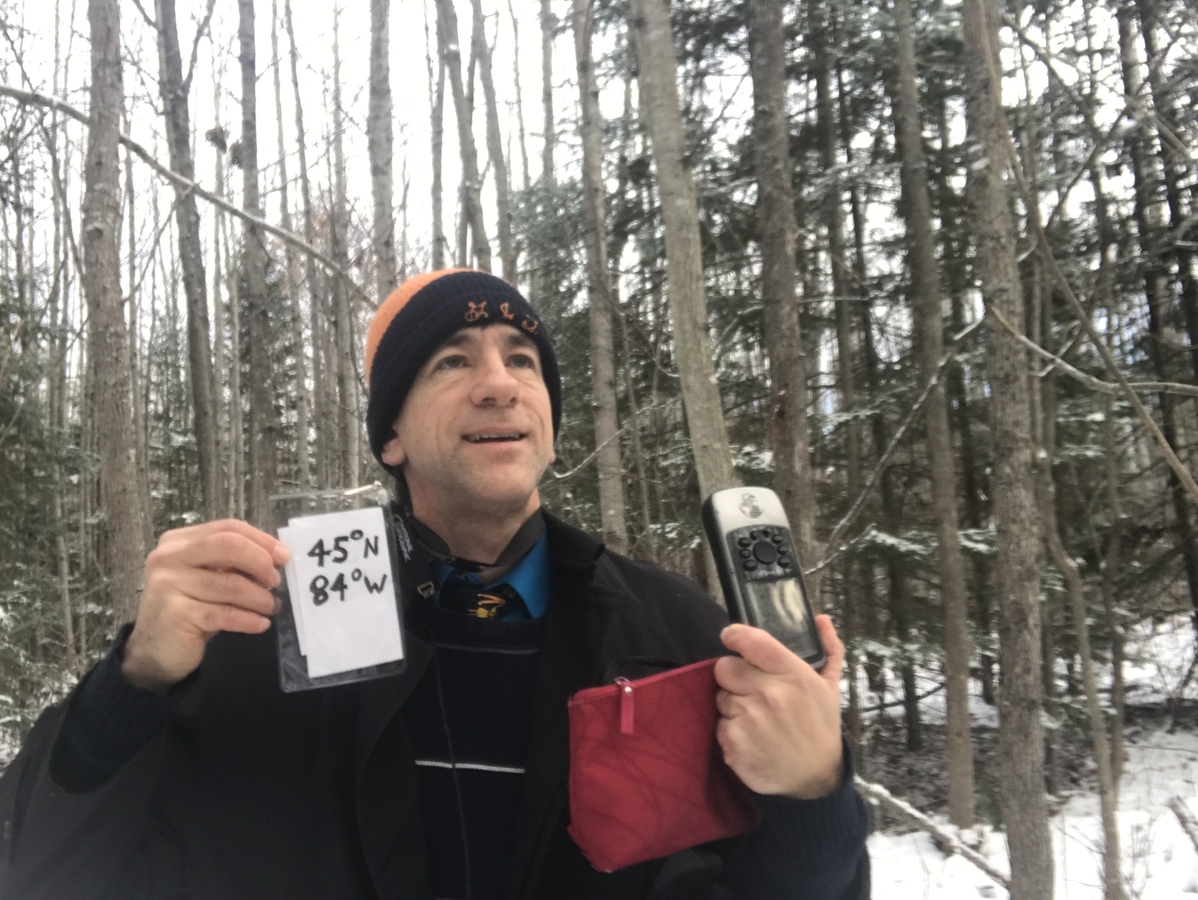 Joseph Kerski at the confluence point. 