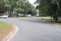 #6: View to the east from the confluence - looks like trash pick up day.