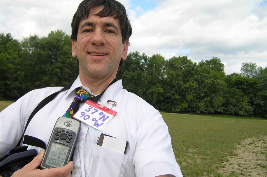 Outstanding in his field:  Joseph Kerski at the confluence of 37 North 90 West.