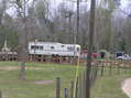 #9: Innovative Mississippi housing:  Camper on stilts, with porch built off the back, 20 km southwest of confluence.