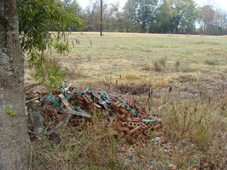 #1: Perhaps the Burnetts have stockpiled a load of bricks in anticipation of building a monument at 34N 90W.