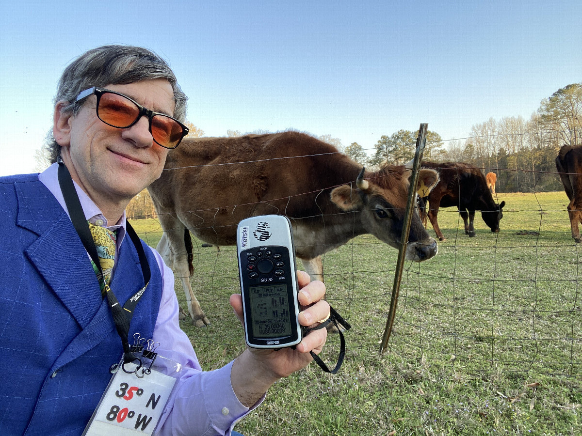 Joseph Kerski and animals at the confluence point.  