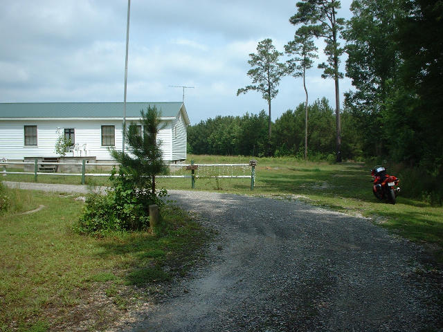 This is (I think) the closest house to the confluence, about 3/4 mile away, with my motorcycle to the right.