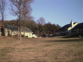 #1: Up the hill, facing the apartments.