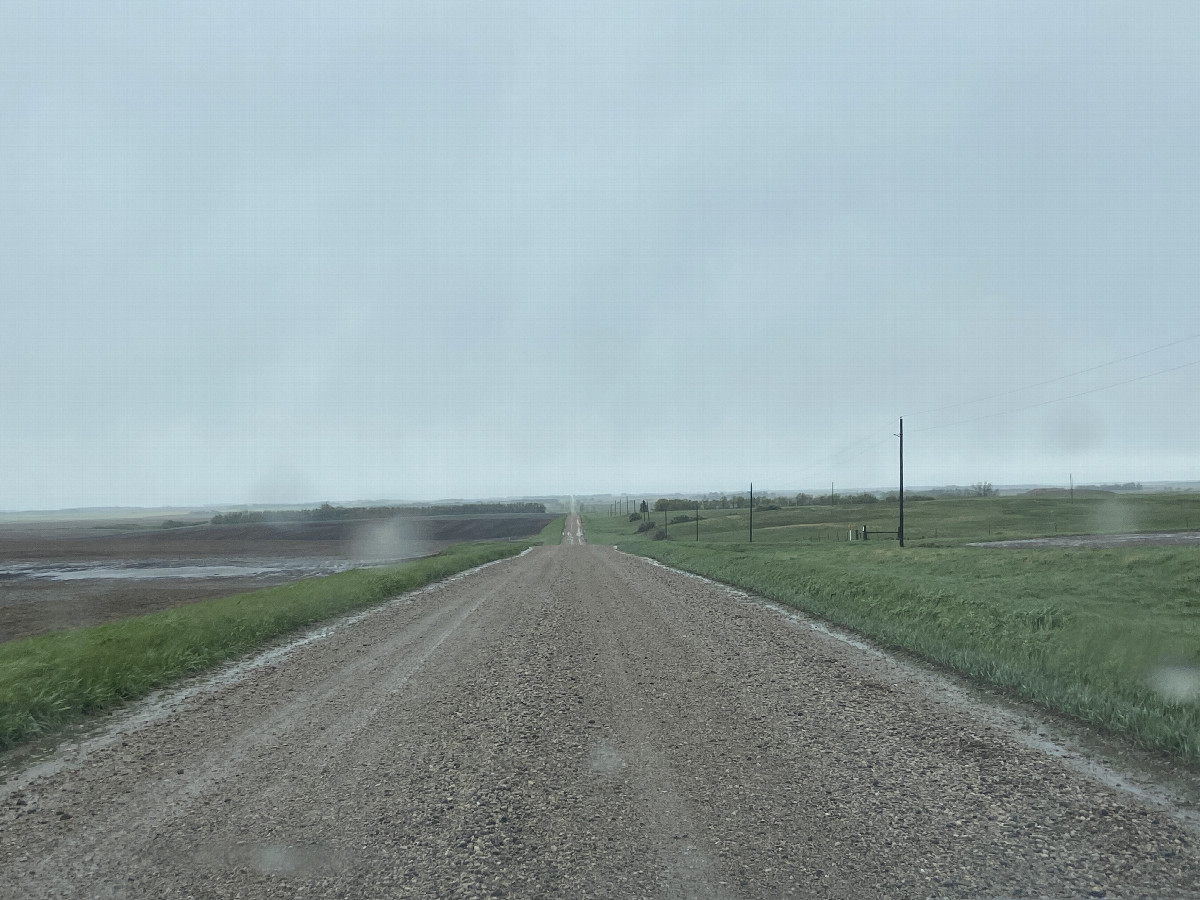 Closest road to the confluence point, looking west.  