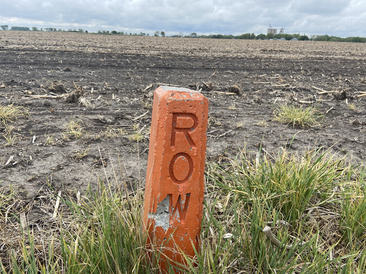 Right of Way post at the confluence field. 