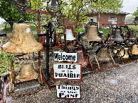 #10: Bells of the Prairie, between this point and 42 North 98 West.  See my article about this collection of 150 bells on Atlas Obscura. 