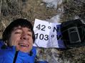 #6: Joseph Kerski lying in the sand hills on the confluence of 42 North 103 West.