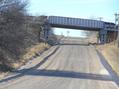 #9: Road about 200 meters north of the confluence, looking west to the railroad overpass.