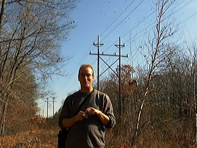 Posing at the confluence underneath the power lines.