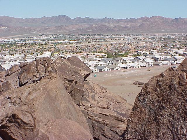 View to the east showing urban encroachment on confluence site.