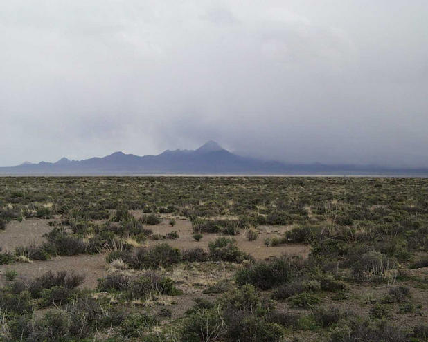 Facing south looking through the Ralston Valley towards Cactus Peak and the remnants of the rain storm I rode through