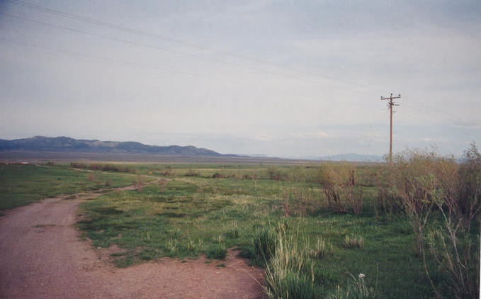 Looking southeast from NV 232.  The point is 1/4 mile straight ahead in the pasture.