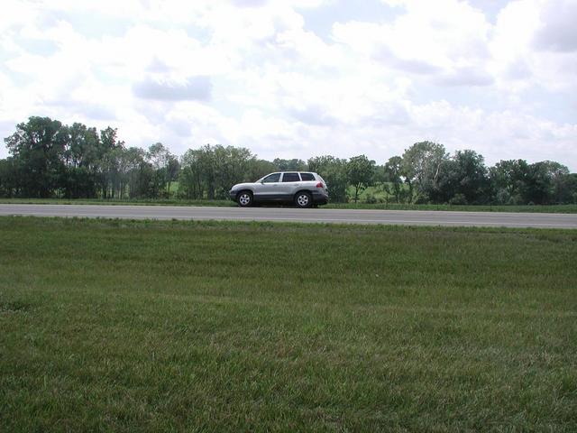 View West from near the confluence point. (Our rental car across Ohio SR-235.)