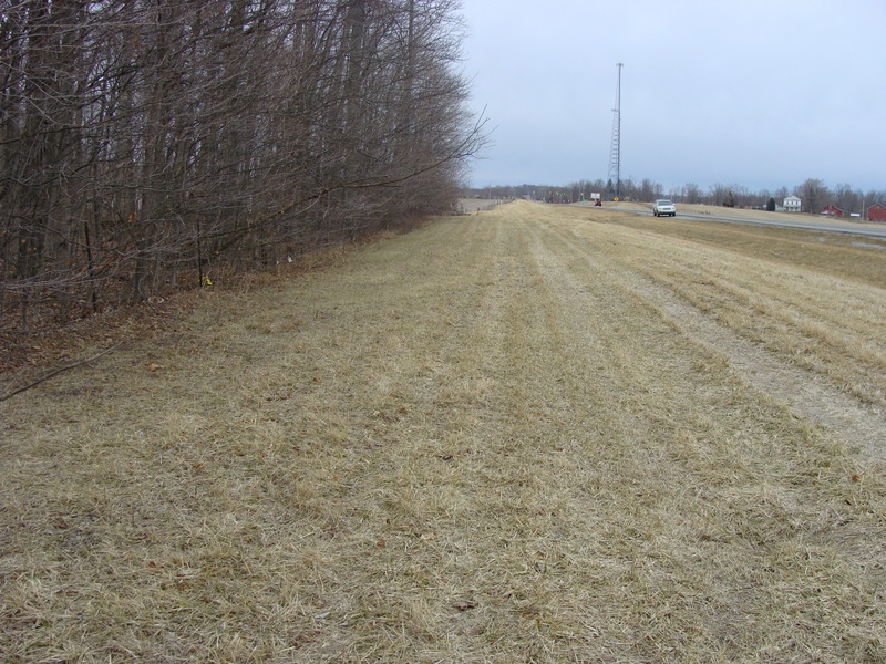 Looking south along the shoulder of Highway 235