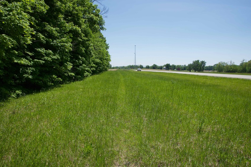 View South (along the highway, from 50 feet west of the point)