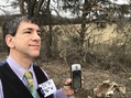 #8: Joseph Kerski posing next to cattle remains at 35 North 96 West. 