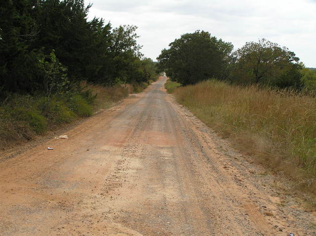 I love the beckoning nature of this photo looking west down the nearest road, 10 meters south of the confluence.