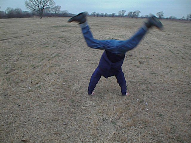 A headless Alex does a cartwheel