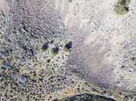 #7: Looking down on the point from 120 m above.  (The point is at the base of the rightmost of the cluster of three trees.)