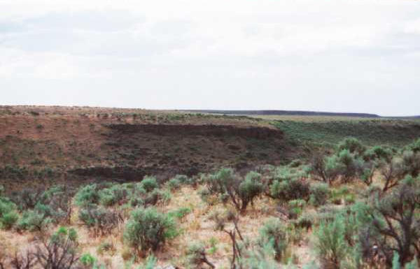 Looking West across Jackass Cr. at some rimrock.