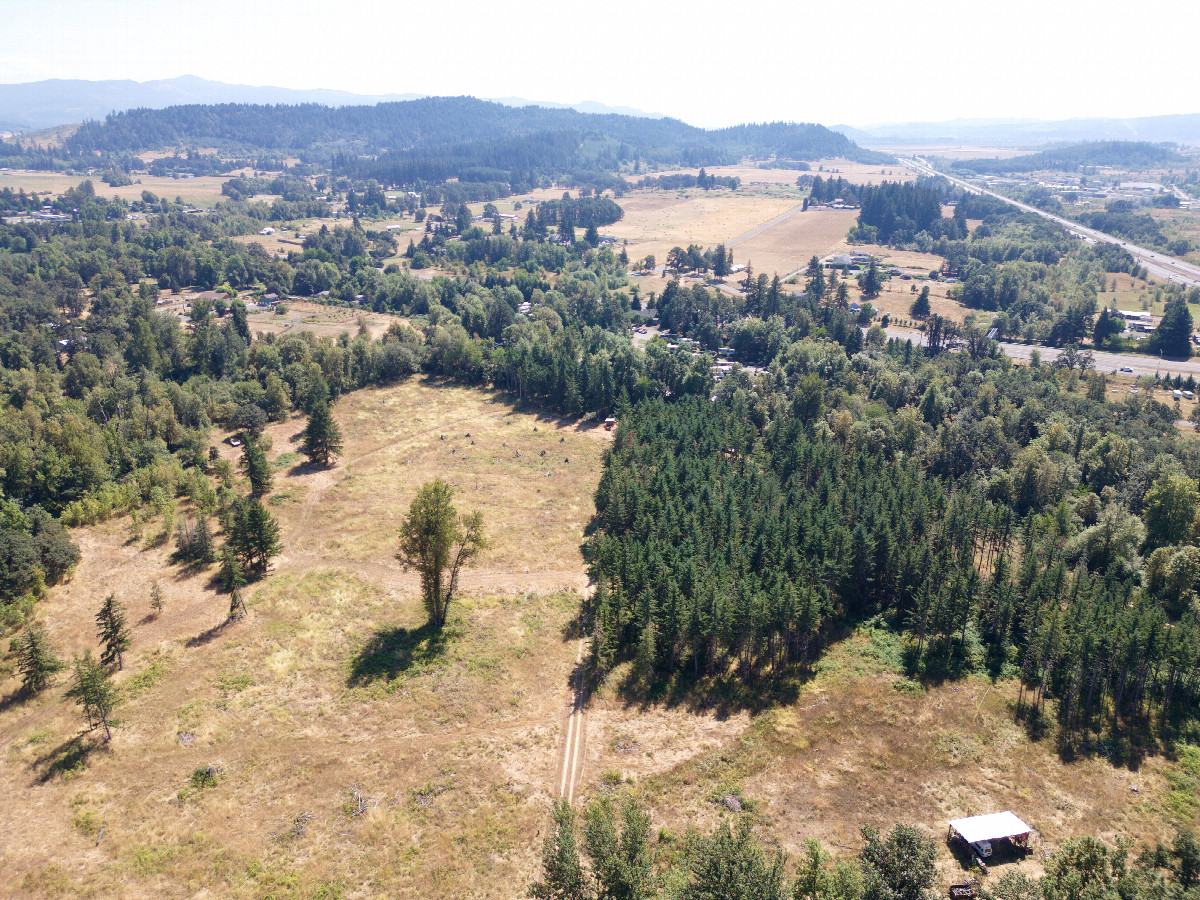 View South (along the I-5 freeway), from 120m above the point