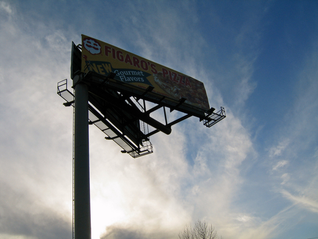 Confluence falls within shadow of this sign