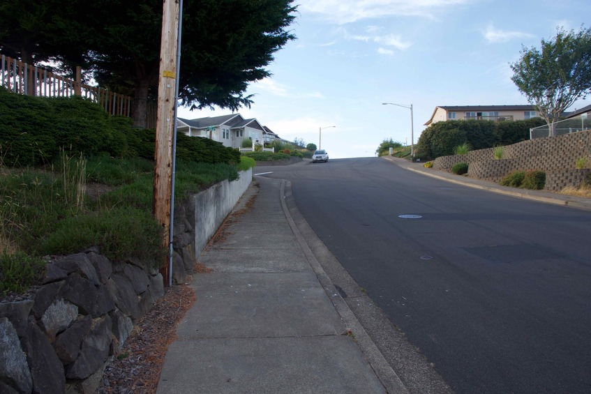 View North (from the sidewalk, 64 feet east of the point)