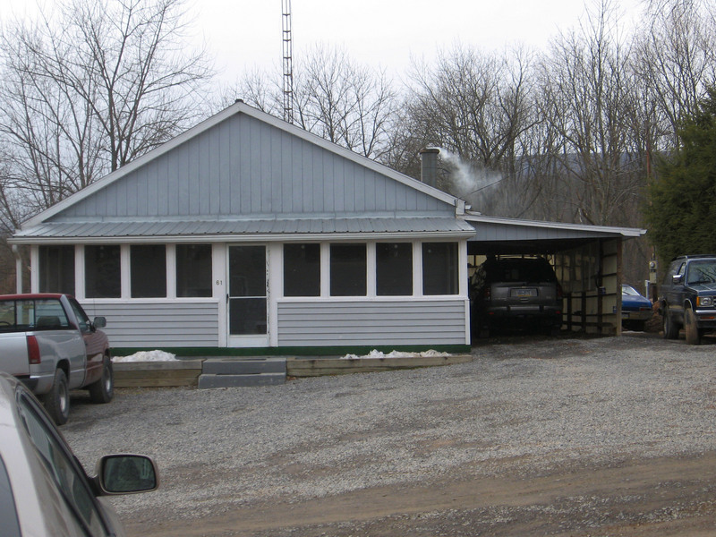 The house across the street to the west.