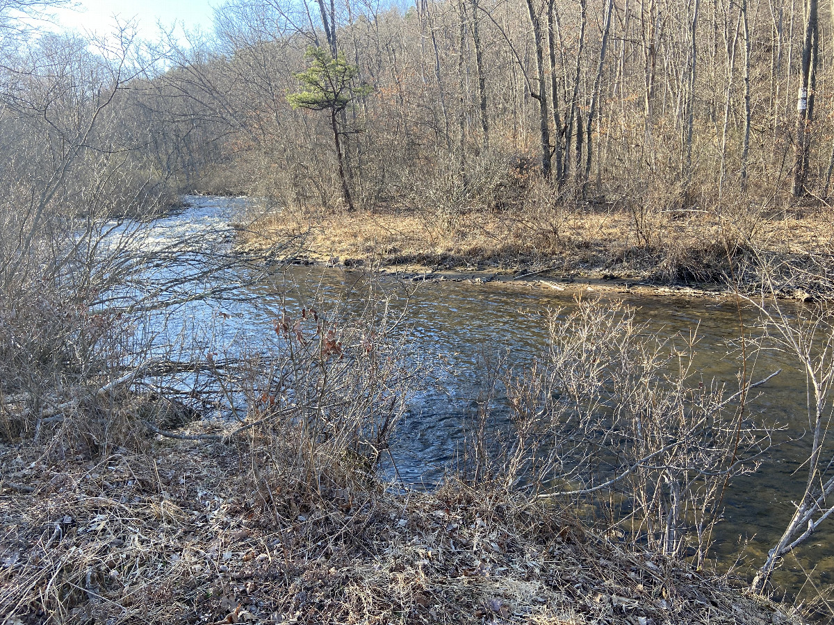 The confluence point lies in the foreground, looking northwest.