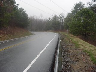 #1: View northwest up the road to the confluence