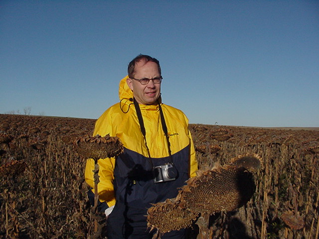 Larry Simonson at the site (& sunflowers)