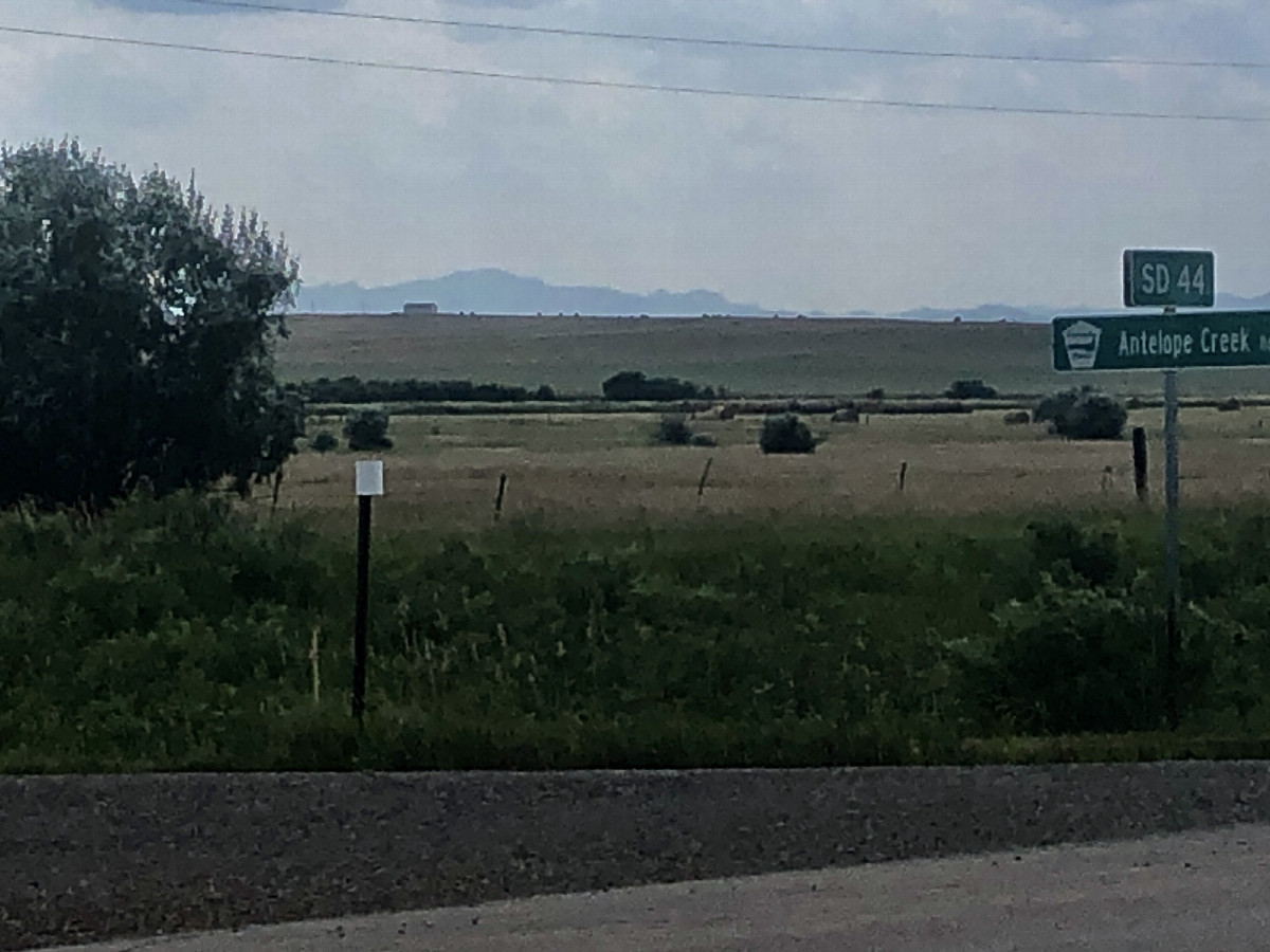 Black Elk Peak, the highest peak in South Dakota, in fact the highest summit between the Rocky Mountains and the Pyrenees Mountains in France, is clearly visible from 44°N 103°W.