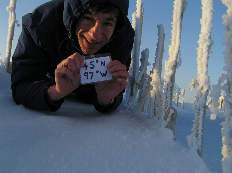 Joseph Kerski at the confluence of 45 North 97 West in the frozen corn.