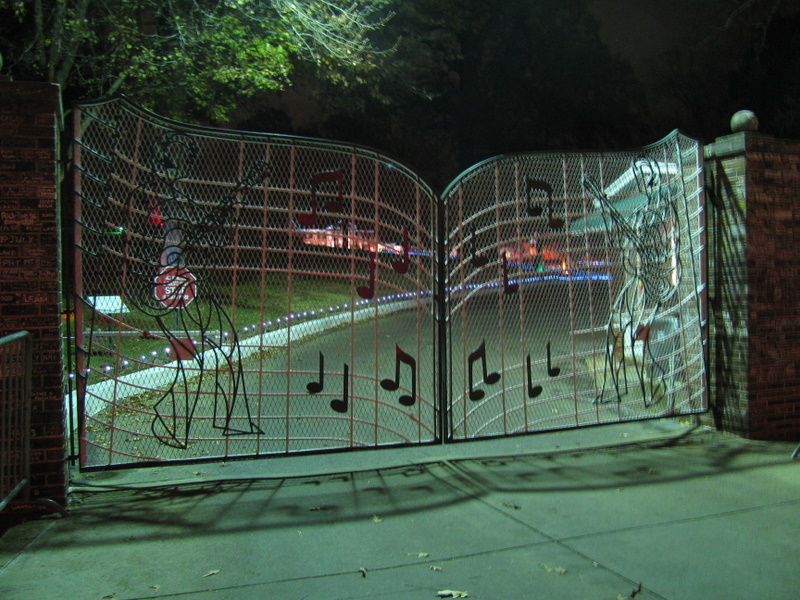 Gates to Elvis Presley's Graceland with home decorated for Christmas.  About 4 miles from the CP.